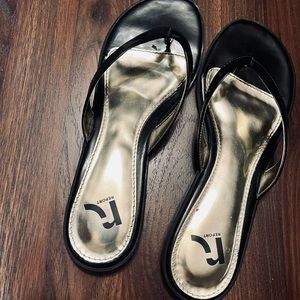 Black patent designer flip flops